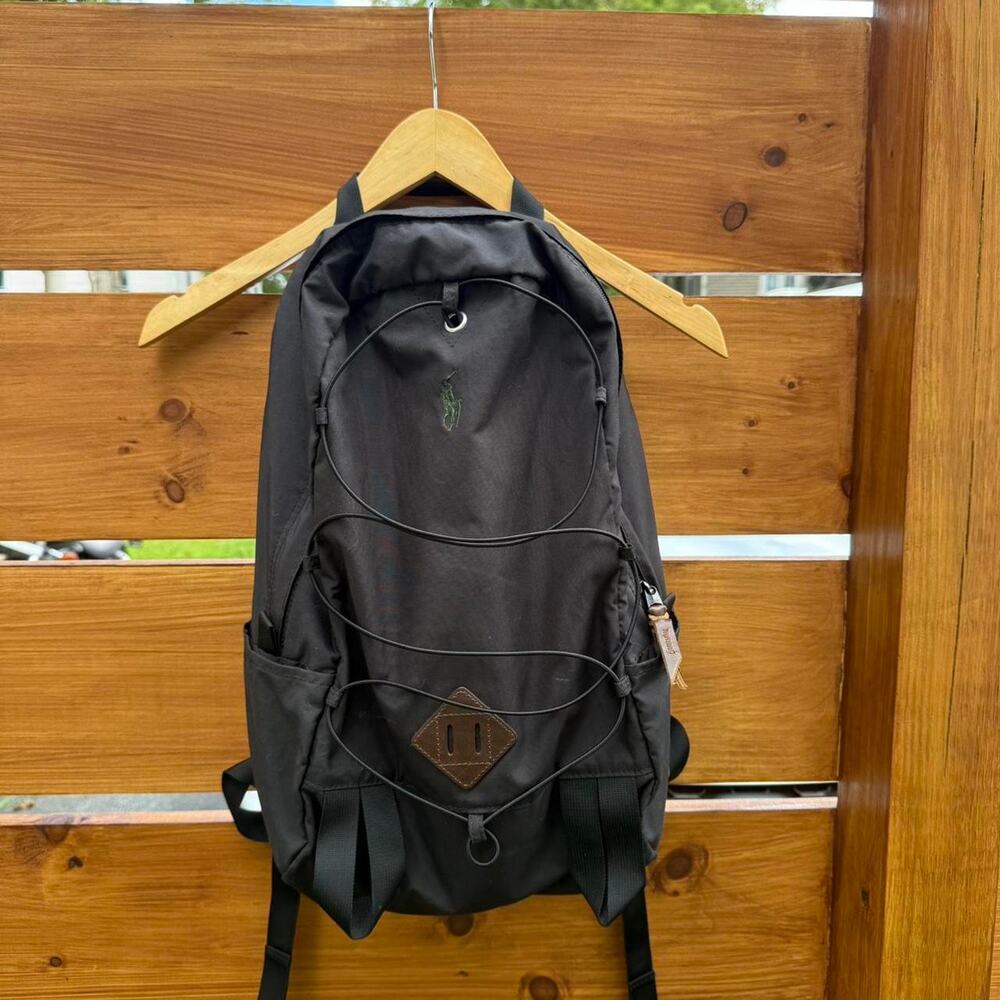 Black nylon backpack with multiple